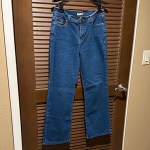 Vintage Levi's Women's 512 Perfectly Slimming Boot Cut Jeans in Deep Blue